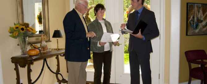 Real estate agent with clients