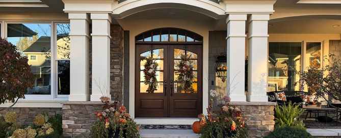 Home with large wooden doors