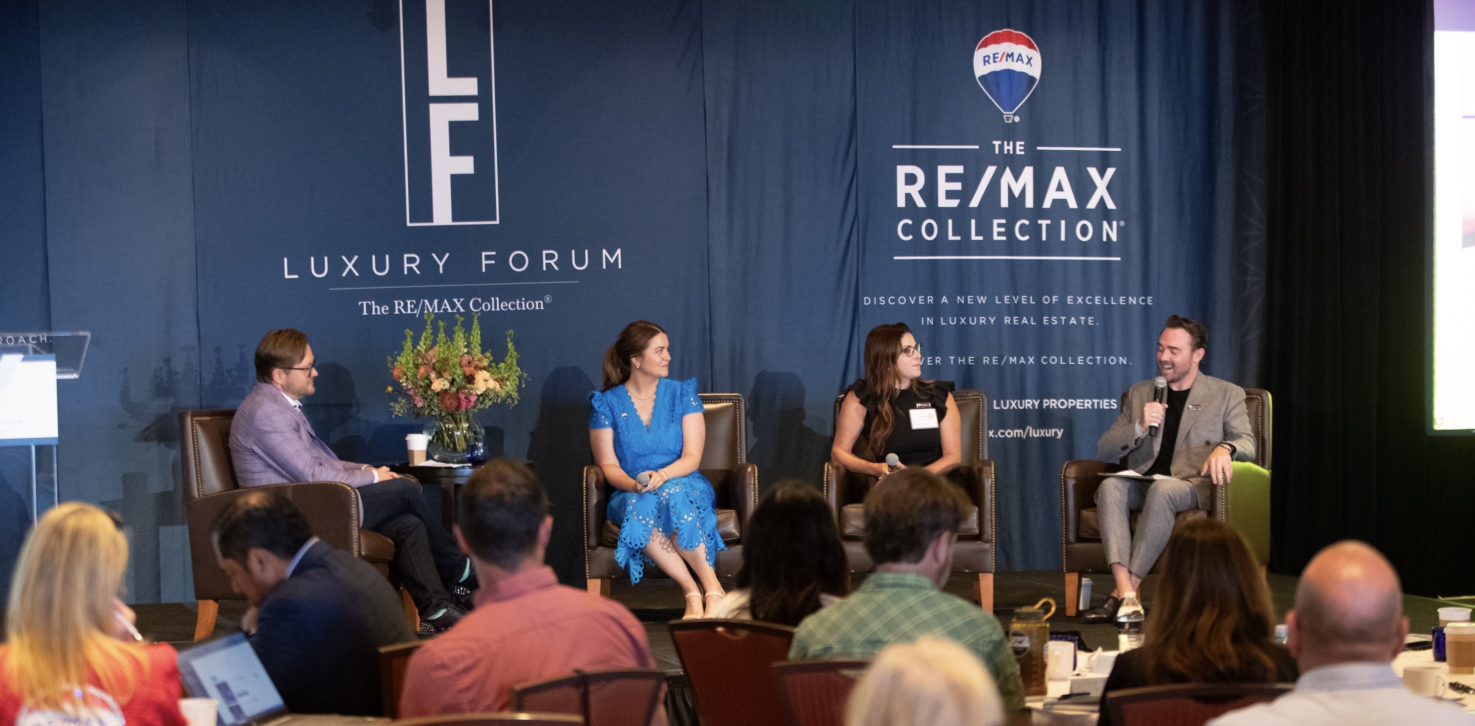 A panel onstage during The RE/MAX Collection 2024 Luxury Forum