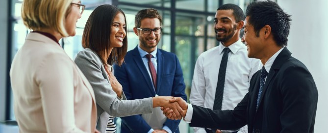 Business people meet one another