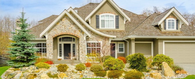 Fall home with green grass